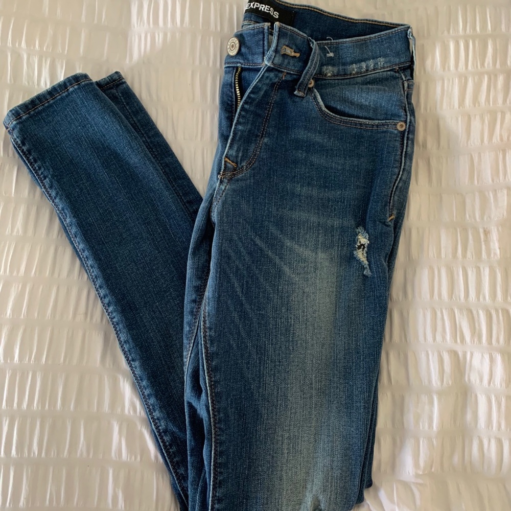 Distressed cropped skinny jeans